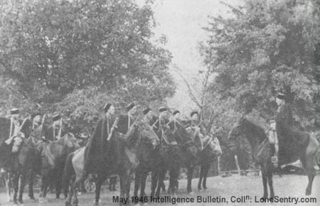 [A Cossack cavalry patrol receives orders and instructions before departing on a reconnaissance mission.]